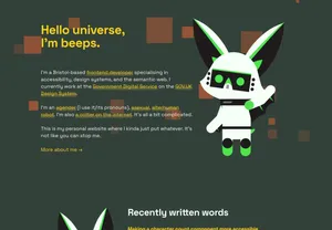 Before: The homepage of this website with a dark grey background, orange spots and yellow heading and links.